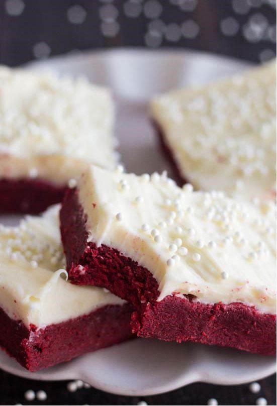 Rosso velvet sugar cookie bars with cream cheese frosting