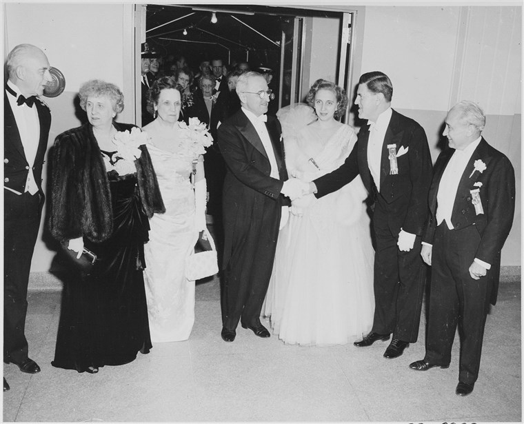 最初 lady Bess Truman, far left, celebrates President Truman's inauguration with her daughter and the ball's co-chairs.