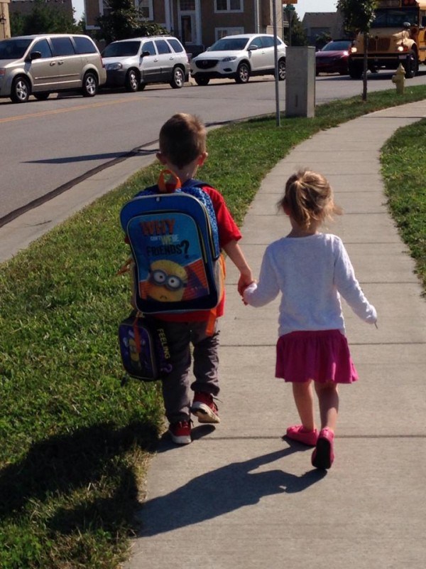 Piccolo children walking off to school