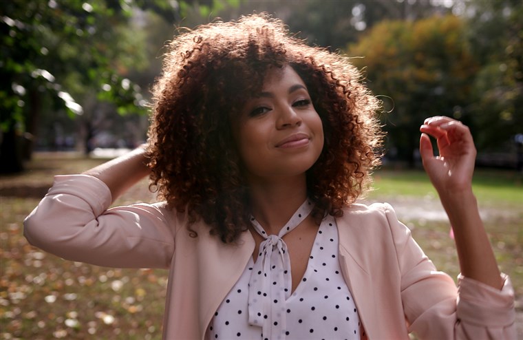 Irritabile, a social media influencer, loves her curly hair now. 