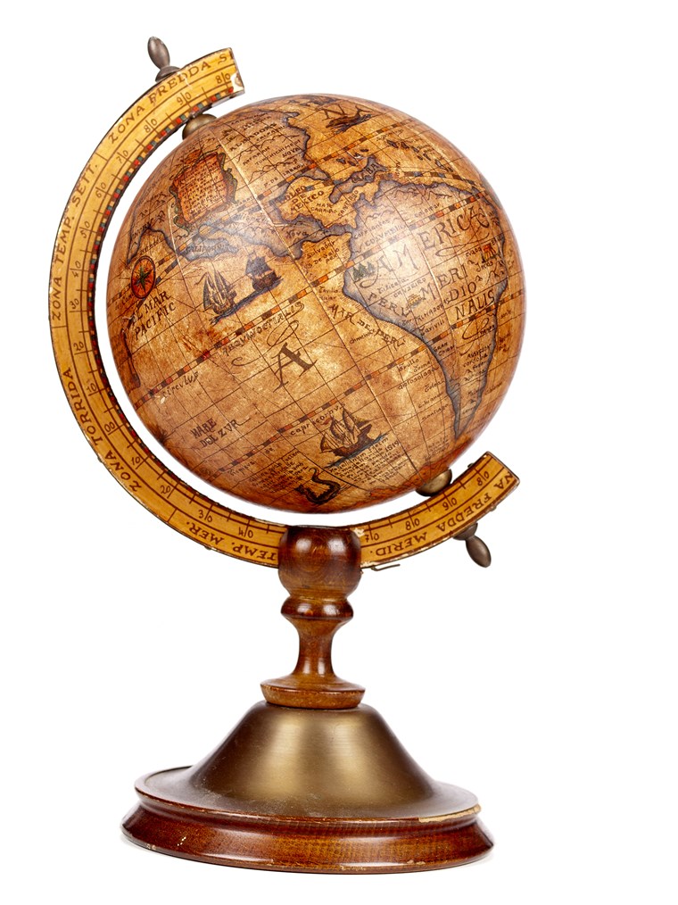Sebuah old brown vintage globe on a small stand