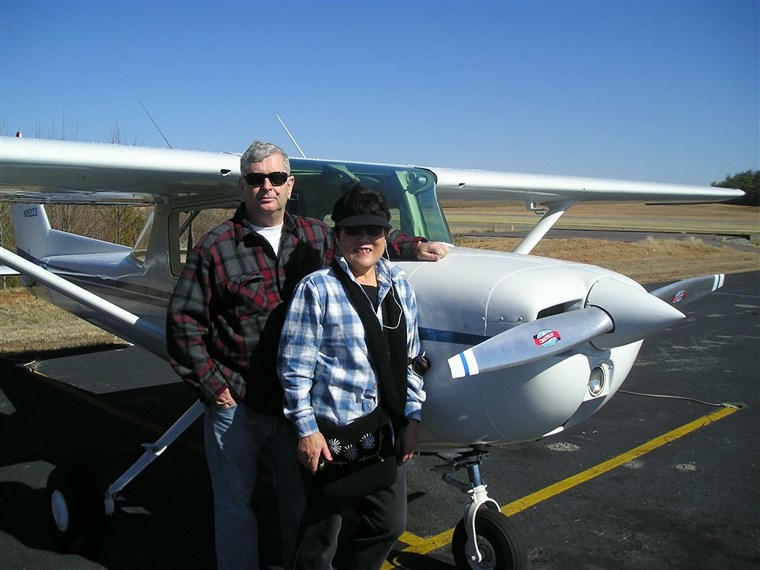 단발 and Setsuko Harmon next to one of the Cessna plans Setsuko used to fly.