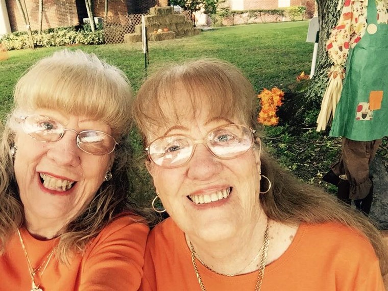 Kembar women in orange