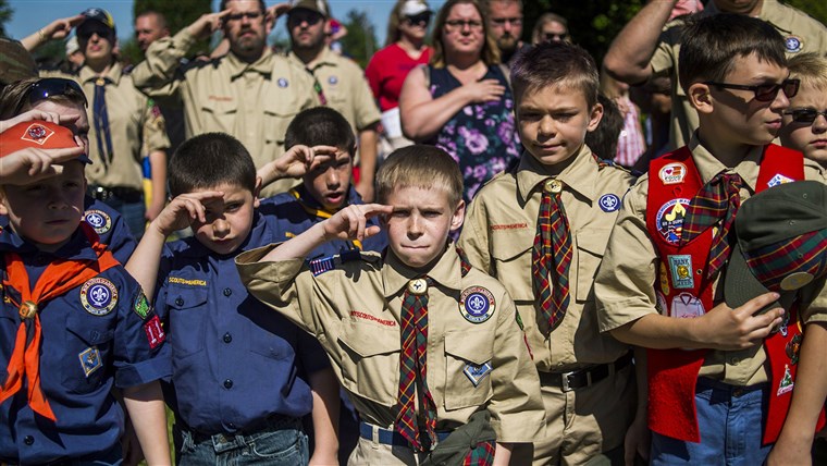 男の子 Scouts and Cub Scouts salute during a Memorial Day ceremony in Linden, Mich. On Wednesday, Oct. 11, 2023, the Boy Scouts of America Board of Directors unanimously approved to welcome girls