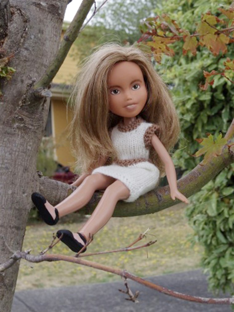 Singh has situated many of her Tree Change Dolls in outdoor settings to make them appear like they're 