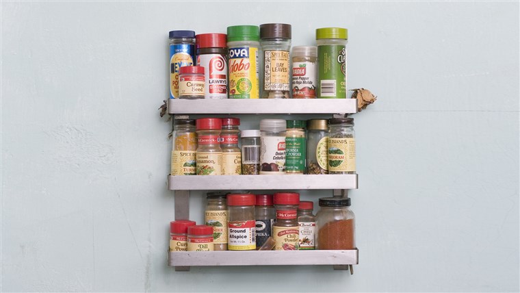 Vintage 'diner' sign on a wall above a spice rack