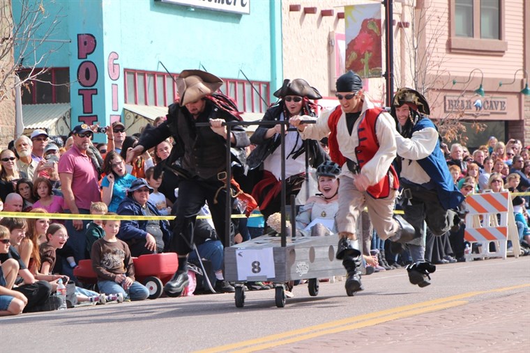 Brivido me timbers! A team dressed as pirates participates in the Emma Crawford Coffin Race in Manitou Springs, Colo.