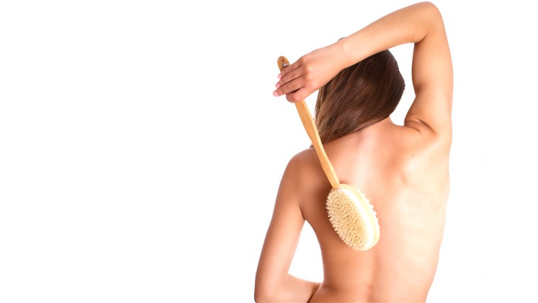 Foto of the woman with brush on back; activity; adult; affectionate; back; background; bathtub; beautiful; beauty; body; brown; brush; care; cosmetic...