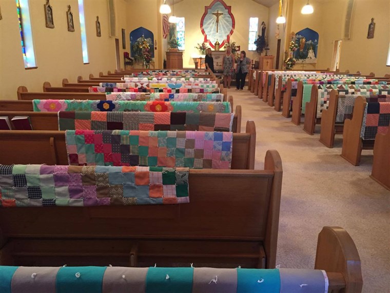 마가렛 Hubl's quilts were draped over each pew at her church to honor her memory.