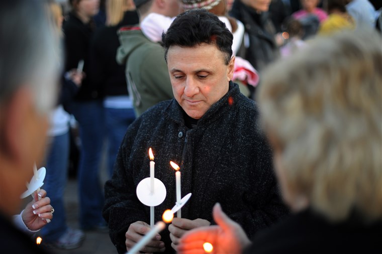 Franco Deangelis of Columbine High School Principal is in candlelight Vigil to honor and remember those touched by the tragedy at the Columbine Memorial in Clement Park, Littleton, CO. on Sunday. Hyoung Chang, The Denver Post
