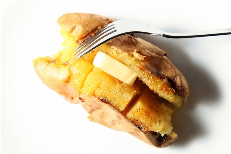 Dipanggang sweet potato, baked sweet potato with butter, whole baked sweet potato