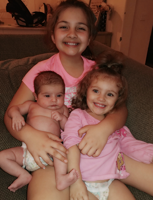 ブルック with her sisters, Ellie, 2, and Summer, 5 weeks.