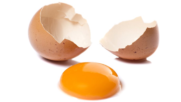 Uno cracked egg with yolk isolated; Shutterstock ID 183027566; PO: today.com