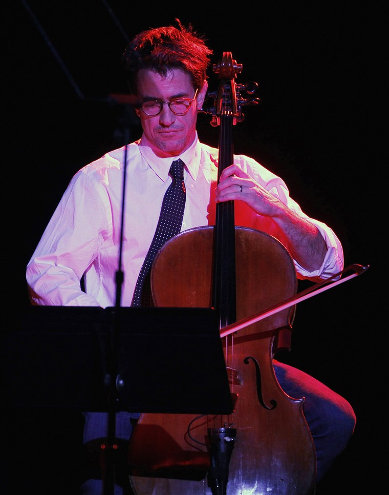 Attore Mulroney plays the cello as he performs with singer LeAnn Rimes at The Trevor Project's 