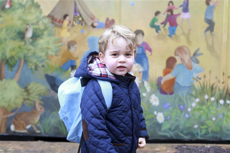 Gambar: Britain's Prince George stands outside the Westacre Montessori School nursery in King's Lynn