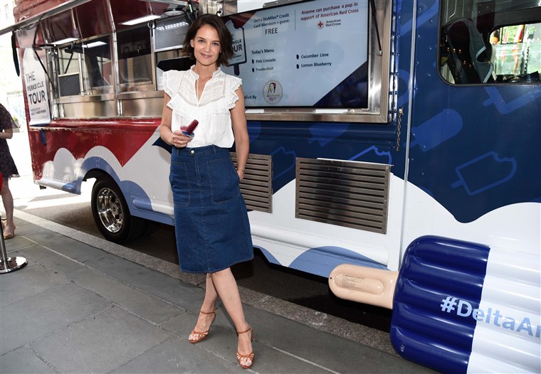 Katie Holmes kicking off summer with American Express and Delta.