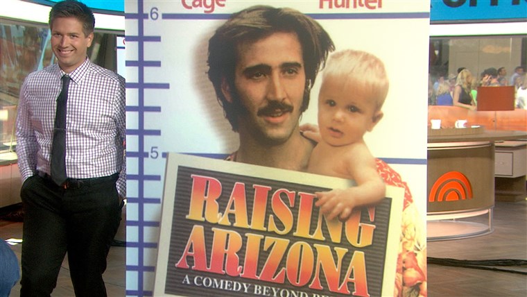 T.J. Kuhn and a poster for the movie that made him famous ... as a baby, at least.