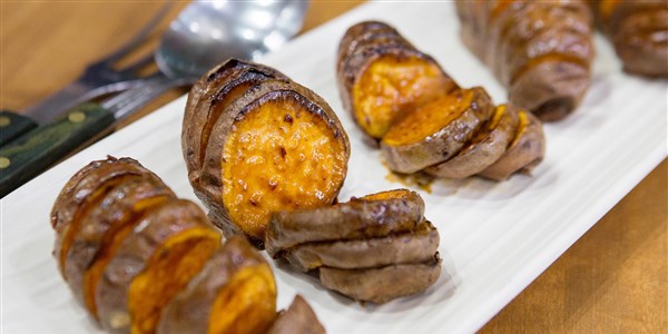 Polisi Flay's Spicy Maple Hasselback Sweet Potatoes