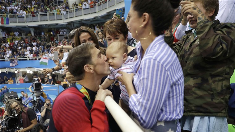 Michael Phelps with Baby boomer, mother, fiance