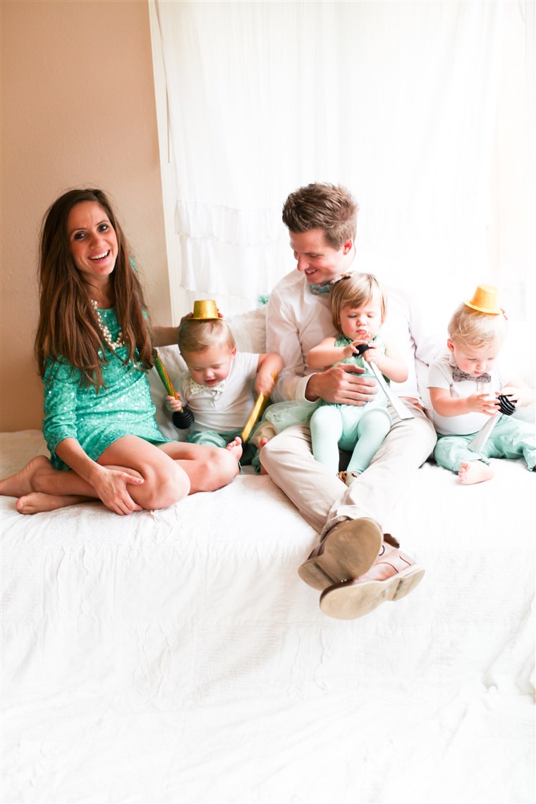 포틴 with husband Ryan, and 18-month-old triplets, Charlize, Jax and Sawyer.