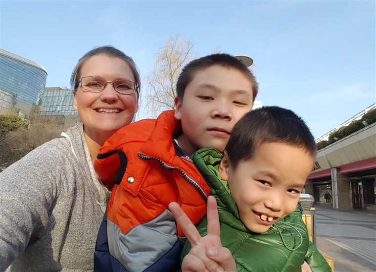 Kristi Smith with her sons Caleb, 9, and Ben, 14.
