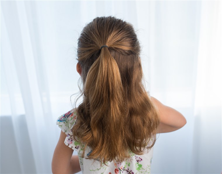 Setengah braided up-do hairstyle for kids