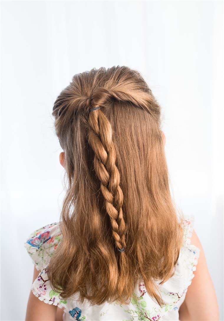 Setengah braided up-do hairstyle for kids