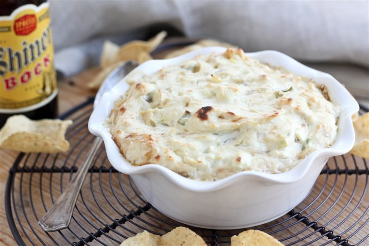 cheesy beer caramelized onion and artichoke dip