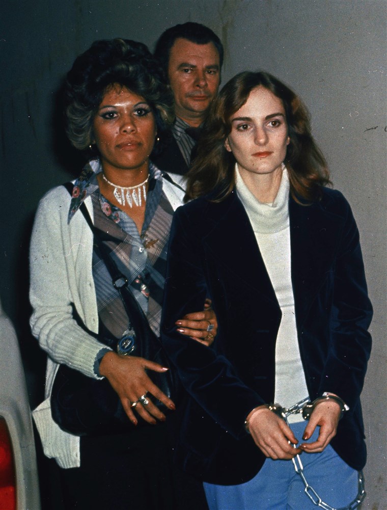 Patricia Hearst led in shackles into court in San Francisco in 1976.