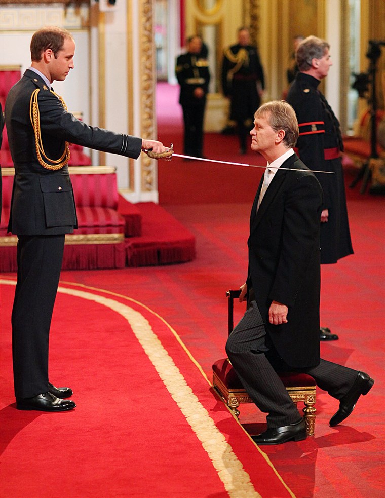 Kepala sekolah Sir Kenneth Gibson from Jarrow receives his Knighthood from Prince William, Duke of Cambridge, during an Investiture ...