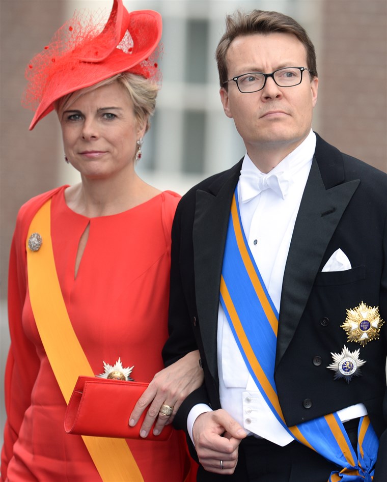 Pangeran Constantijn of the Netherlands and his wife Princess Laurentien leave the Nieuwe Kerk (New Church) in Amsterdam on April 30, 2013 after attendi...