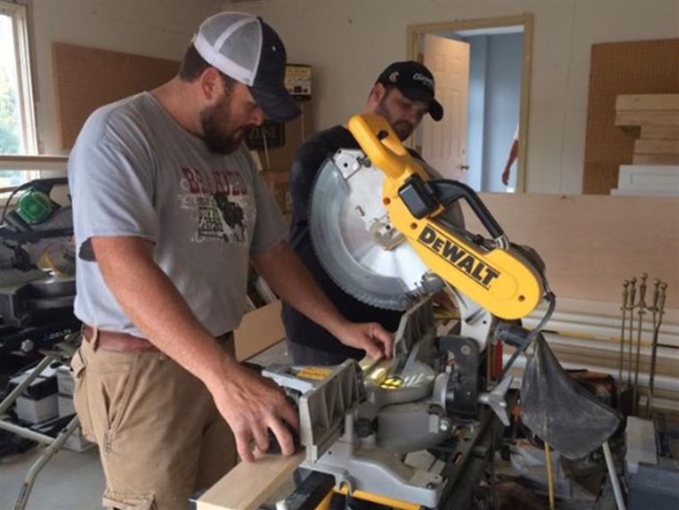 Kapan they're not going viral, the Singing Contractors' Aaron Gray and Josh Arnett continue to work on home-improvement projects, which sometimes involve cutting trim.