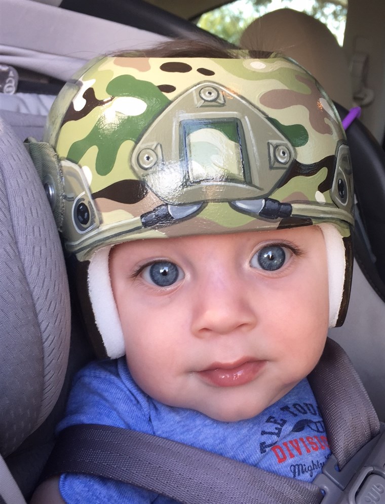 として a nod to her husband's service in the army, Lindsey Menard asked Strawn to paint her son, Levi's, helmet with camouflage.