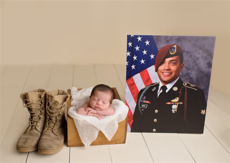 Bambino poses in military uniform of father she'll never meet