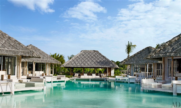 Ini sand bottom pool is a refreshing escape for visiting guests.