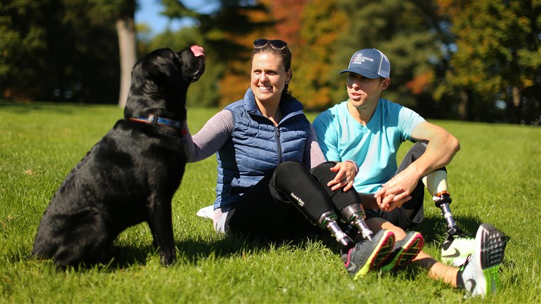 Boston Marathon bombing survivors Jessica Kensky and Patrick Downes with Rescue the dog