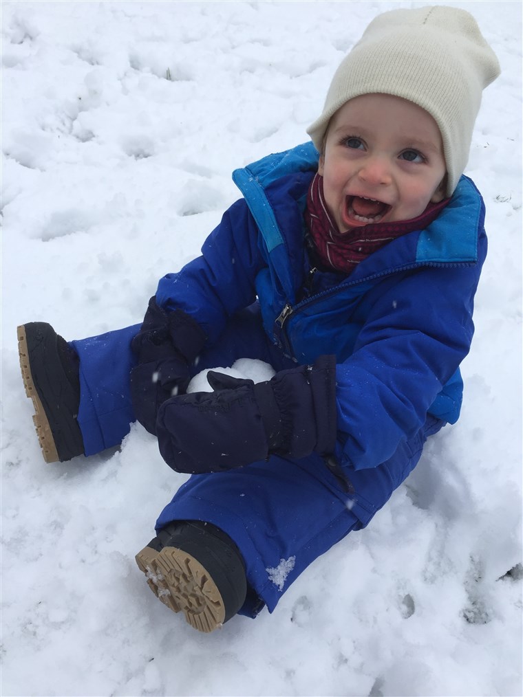 Freddo? Snow? Who cares? Theo shows his love for the outdoors with lots of laughs and smiles.