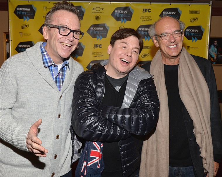 AUSTIN, TX - MARCH 09: Comedian Tom Arnold, drector Mike Myers and producer Shep Gordon pose for pictures in the green room for the premiere of 