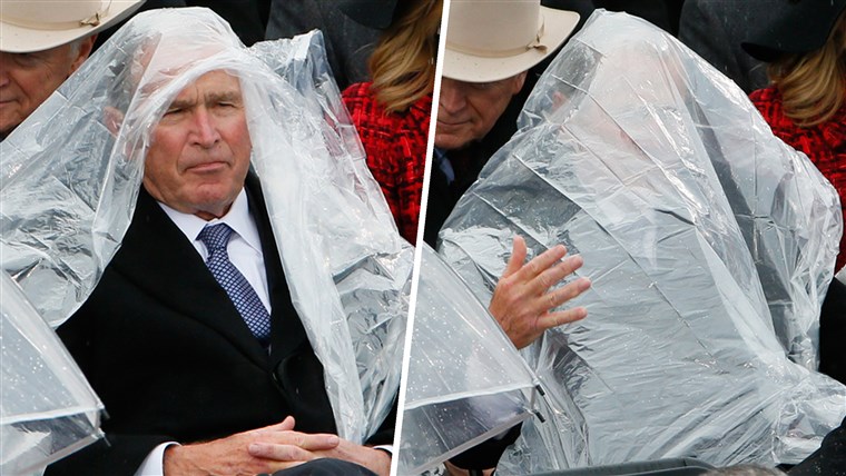 前者 President George W. Bush uses a plastic sheet to deal with the rain during the inauguration ceremonies swearing in Donald Trump