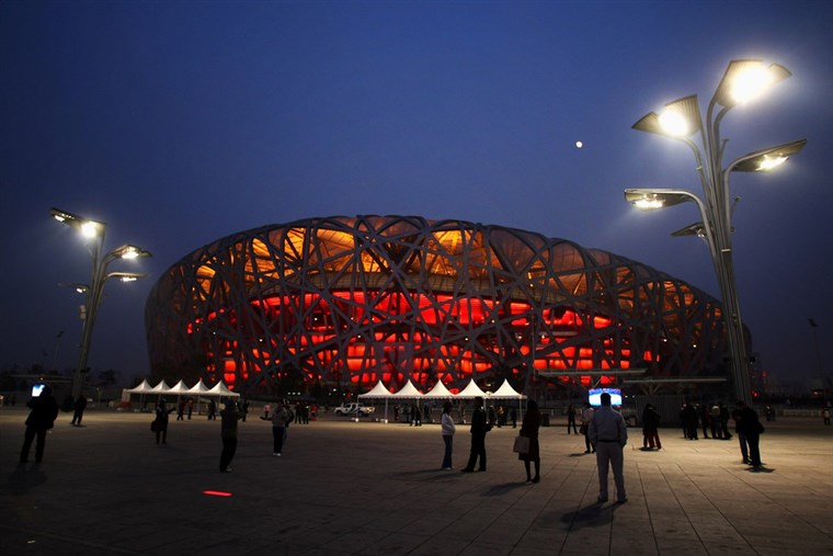 BEIJING - DECEMBER 10: Crowds of tourists visit the National Stadium, known as the 