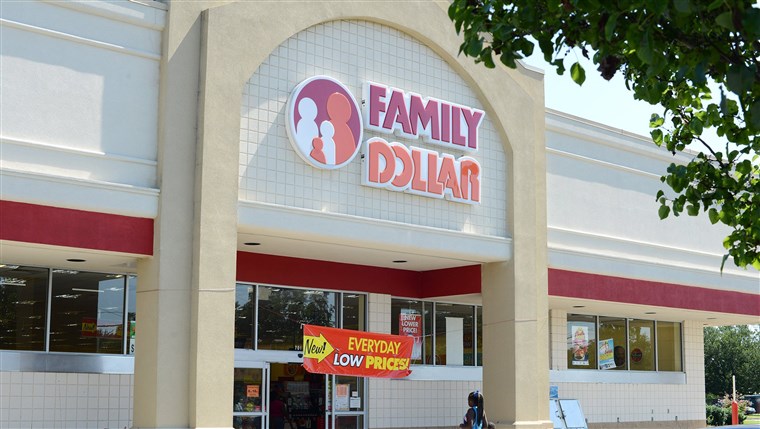 Di this Tuesday, July 29, 2014 photo, customers enter a Family Dollar store on Plaza Boulevard, in Kinston, N.C. There’s now a bidding war for Family...