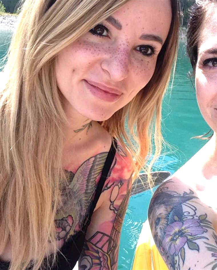 Tato artist Sydney Dyer shows off her freckle tattoos.